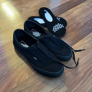 Women’s 8, men’s 6.5 black classic Vans